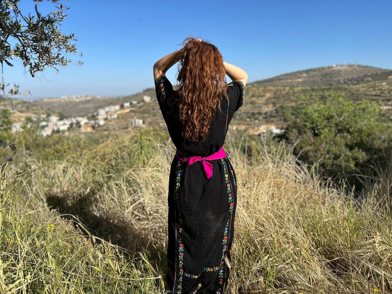 Palestinian Girl Looking Over Land