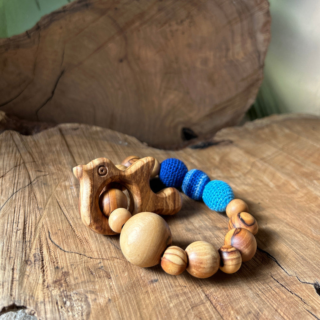 Hand Crafted Blue Crocheted Olive Wood Teething Rings for Babies with Peace Dove