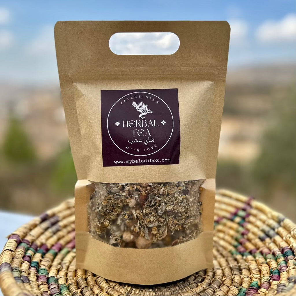 http://handmadepalestine.com/cdn/shop/files/baladi-foods-herbal-tea-blend-crafted-in-palestine-shay-a-shab-1_1024x.heic?v=1698786360