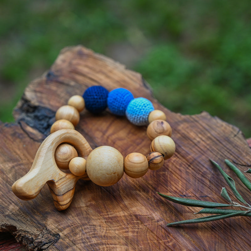 Blue Crocheted Olive Wood Teething Rings for Infants with Peace Dove
