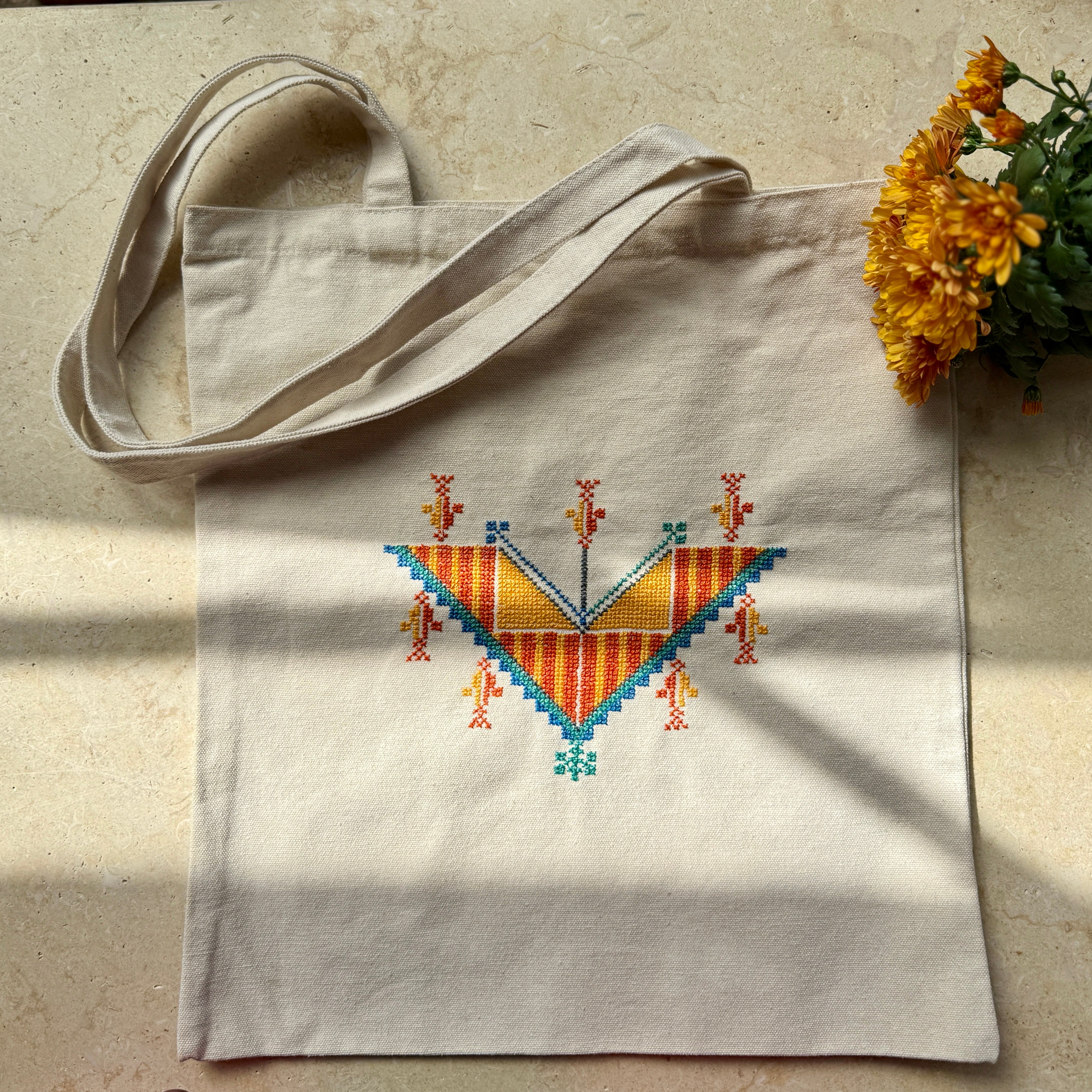 Palestinian Tatreez orange and teal on Beige Tote Hand Stitched by Women Artisans in Palestine