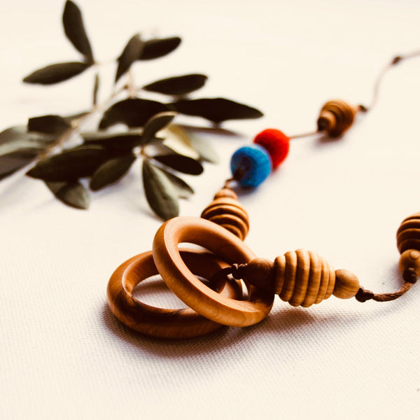 Little Olea - Olive Wood Tree Nursing Necklace With Blue & Red Beads